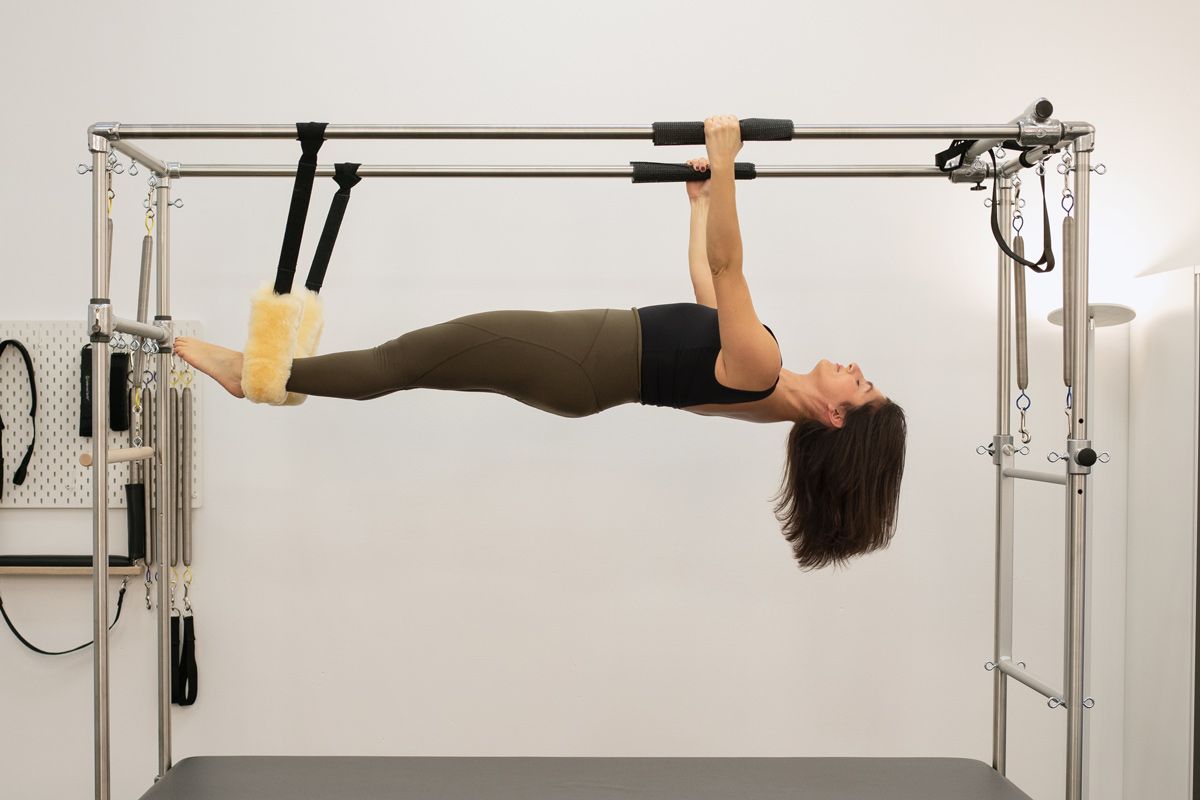 Hanging on Pilates Cadillac